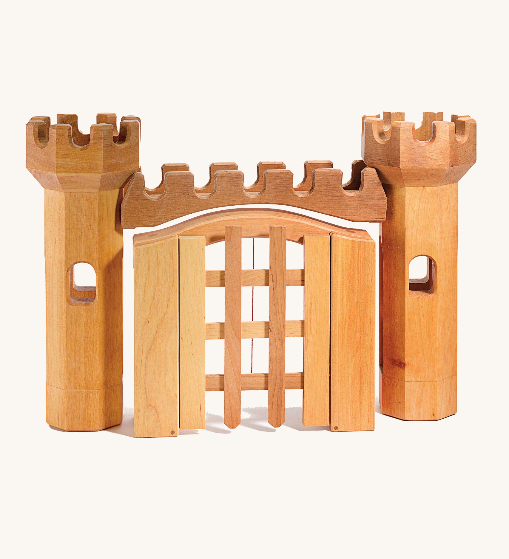 Ostheimer toy castle trellised gate and towers (available separately) on a cream background