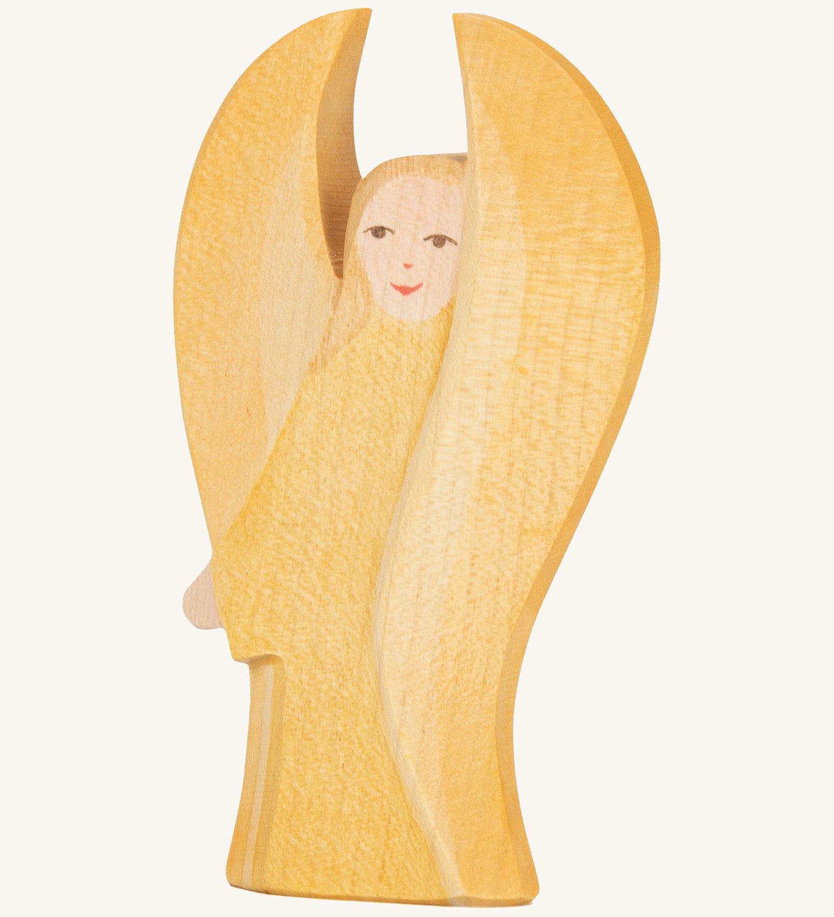 Ostheimer Yellow Guardian Angel figure on a cream background