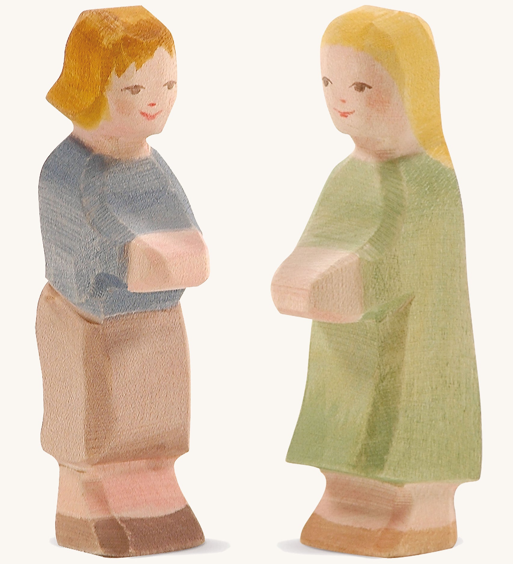 Ostheimer wooden Hansel and Gretel figures on a cream background.