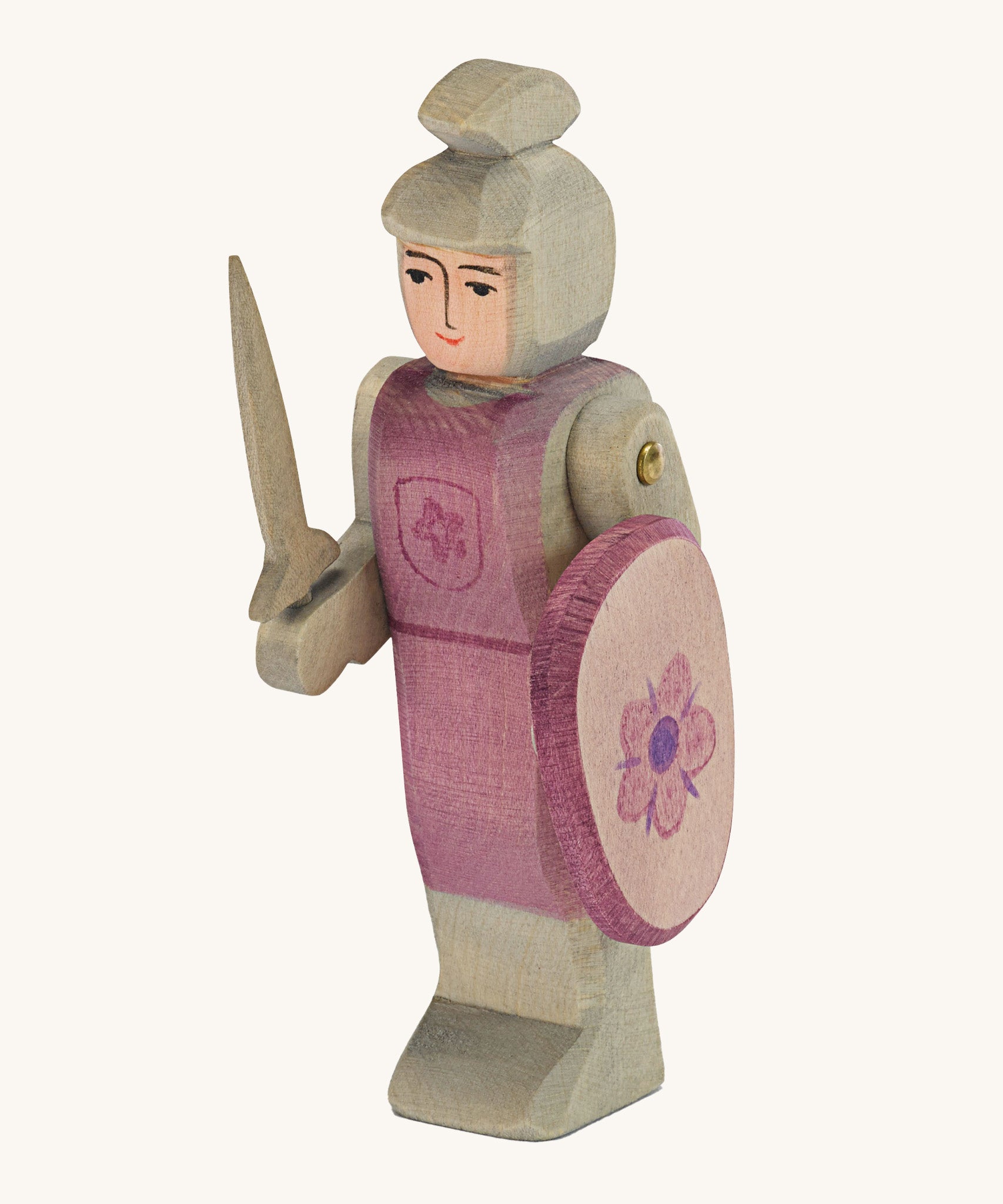 Ostheimer pink standing knight sword and shield on a cream background.