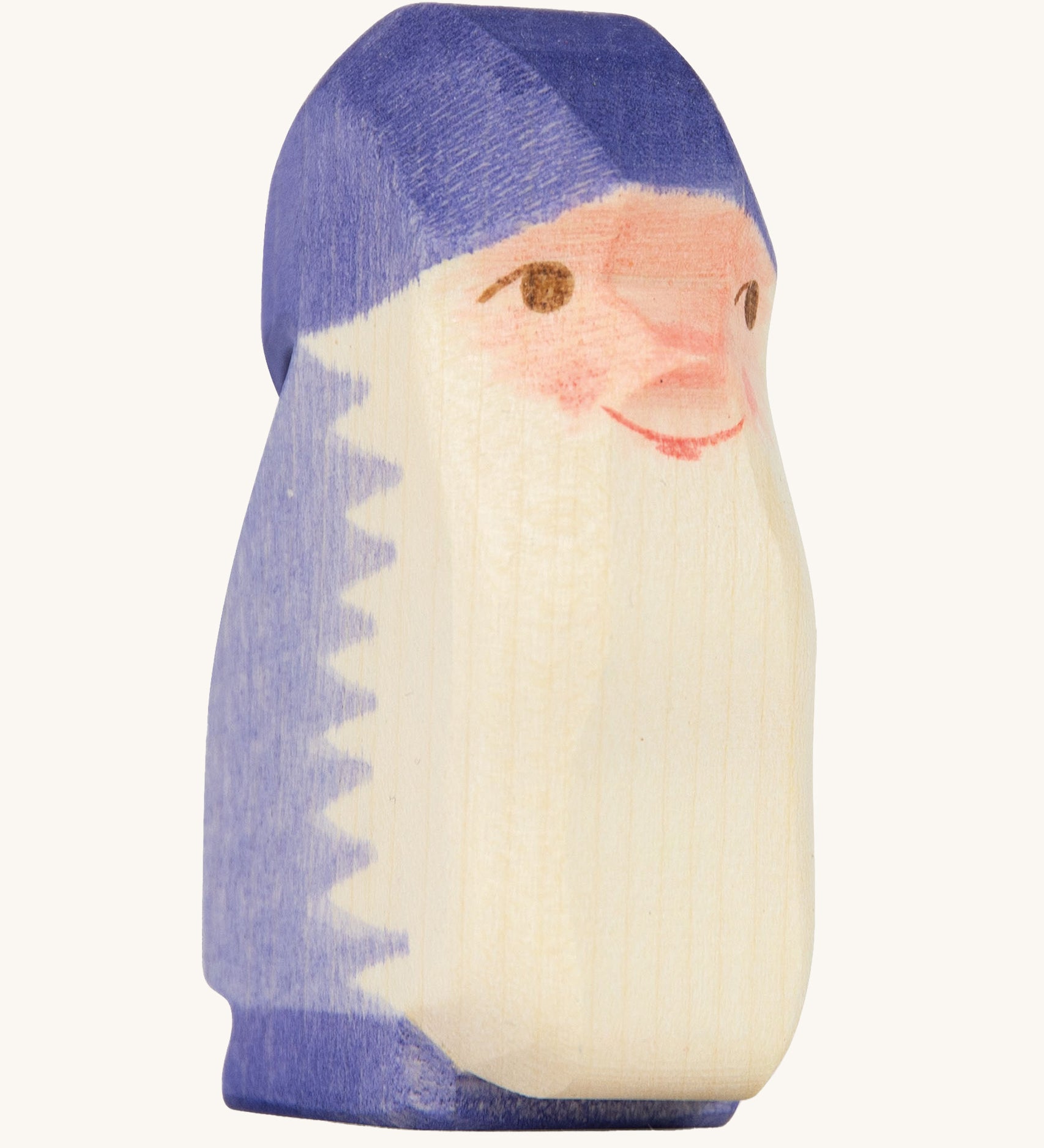 A purple wooden Ostheimer dwarf figure on a cream background.