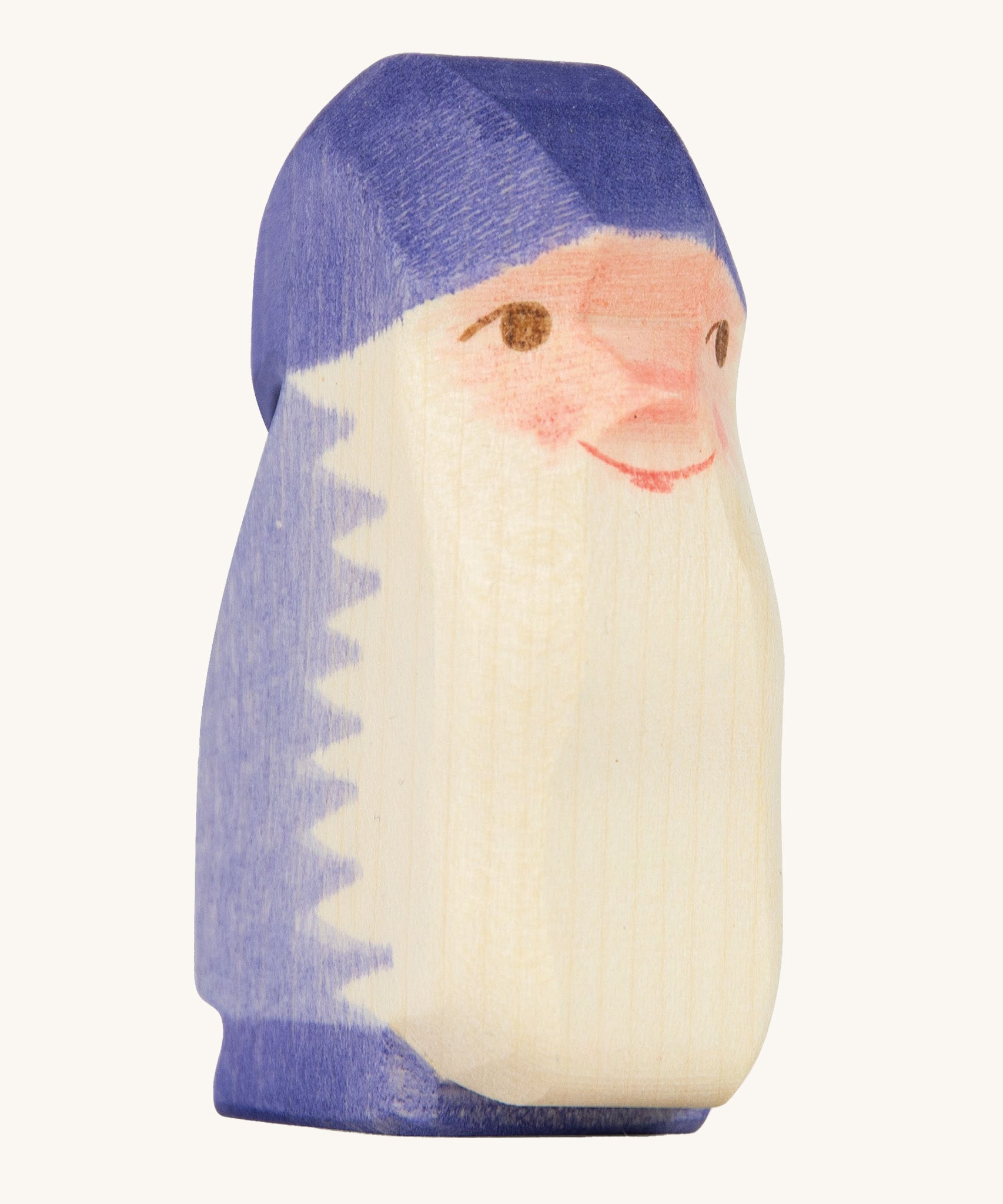 A purple wooden Ostheimer dwarf figure on a cream background.