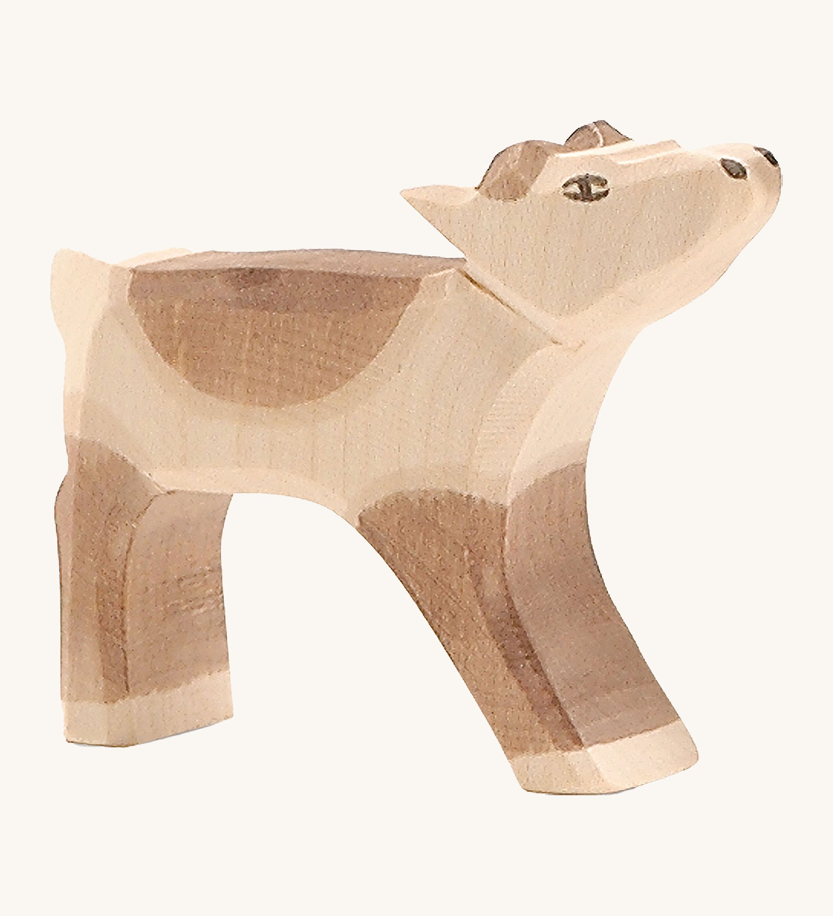 Ostheimer wooden reindeer calf on a cream background.