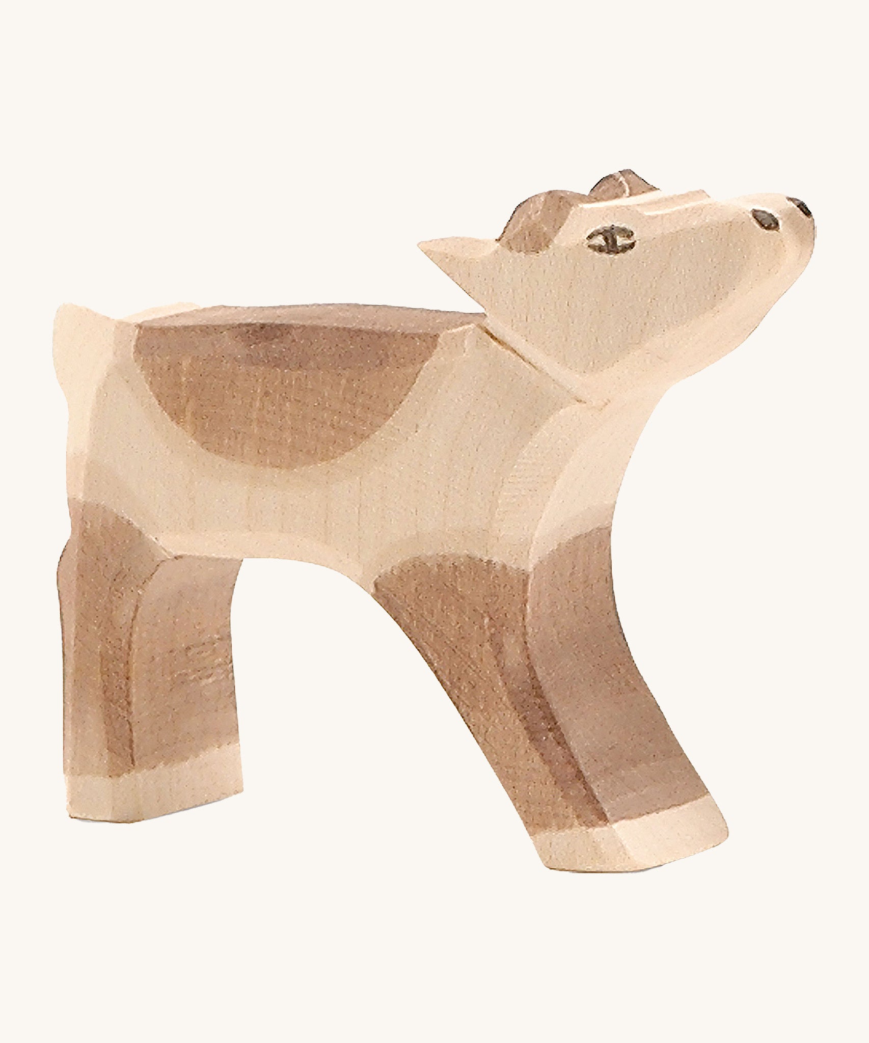 Ostheimer wooden reindeer calf on a cream background.