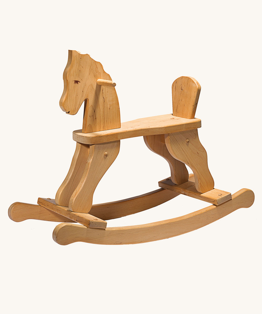 Ostheimer wooden rocking horse ride on toy on a plain background. 