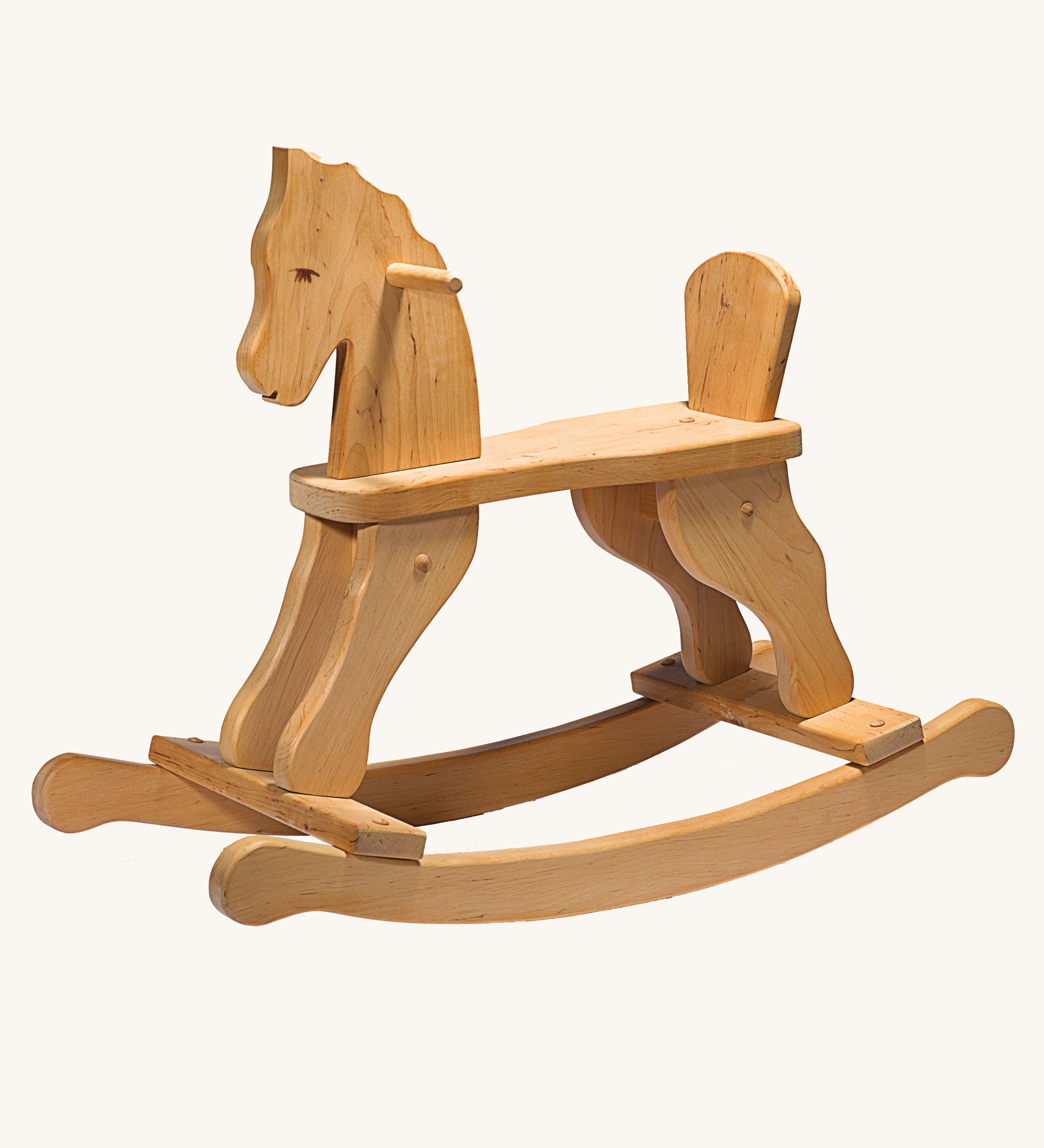 Ostheimer wooden rocking horse ride on toy on a plain background. 