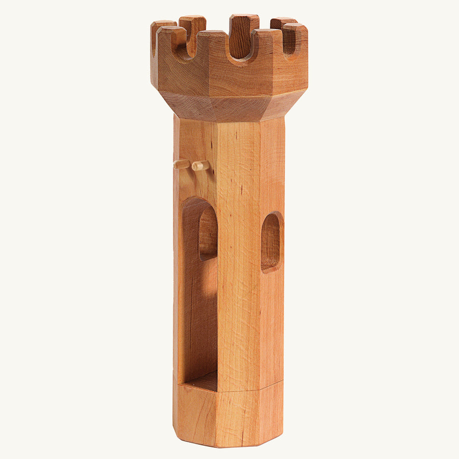 Ostheimer children's handmade wooden round tower toy on a beige background