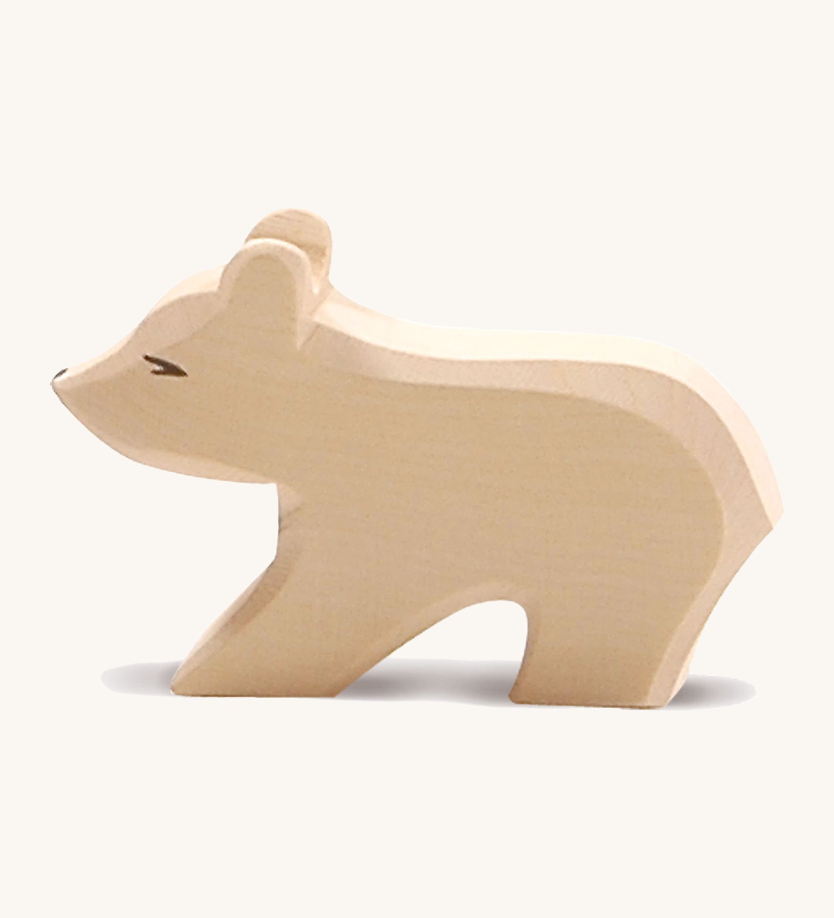 A small wooden Ostheimer polar bear figure with a short neck