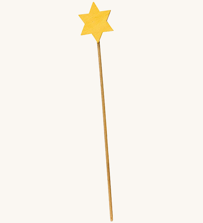 A wooden Ostheimer staff with a yellow star on the top for the Ostheimer angel on a cream background.