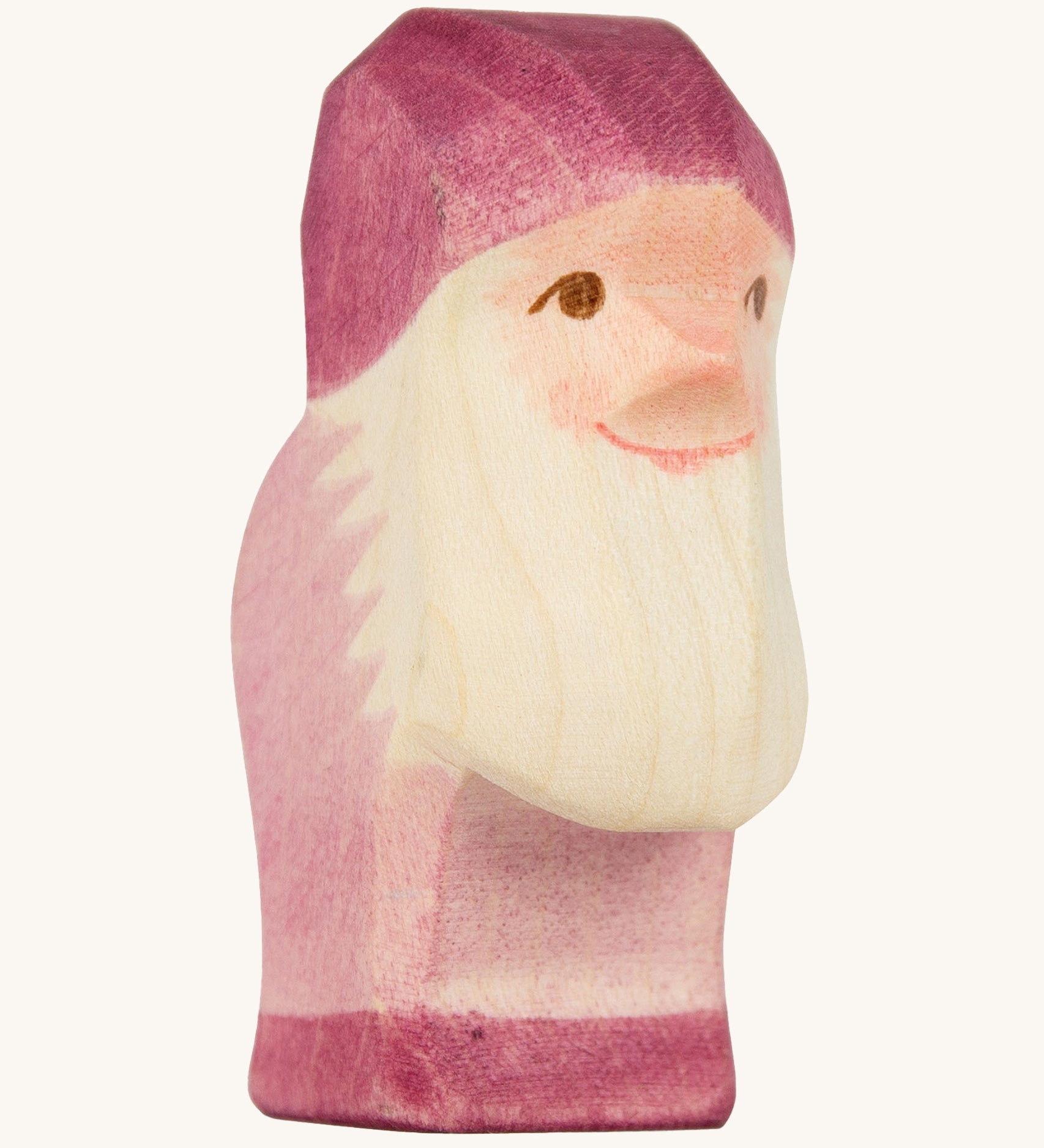 A violet wooden Ostheimer dwarf figure on a cream background.