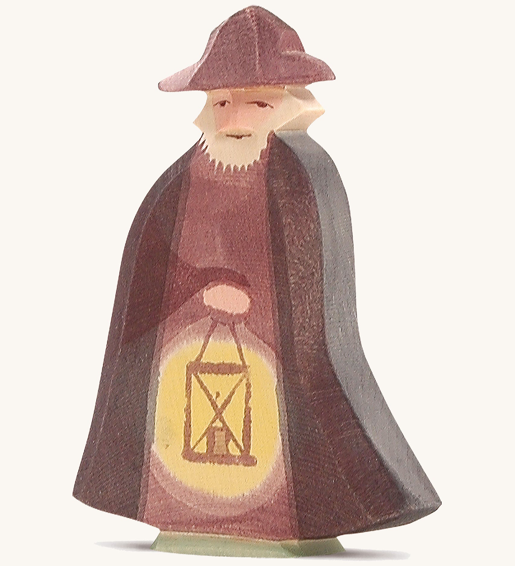 A wooden Ostheimer night watchman figure holding a lantern and wearing a purple cloak and matching purple hat on a cream background.