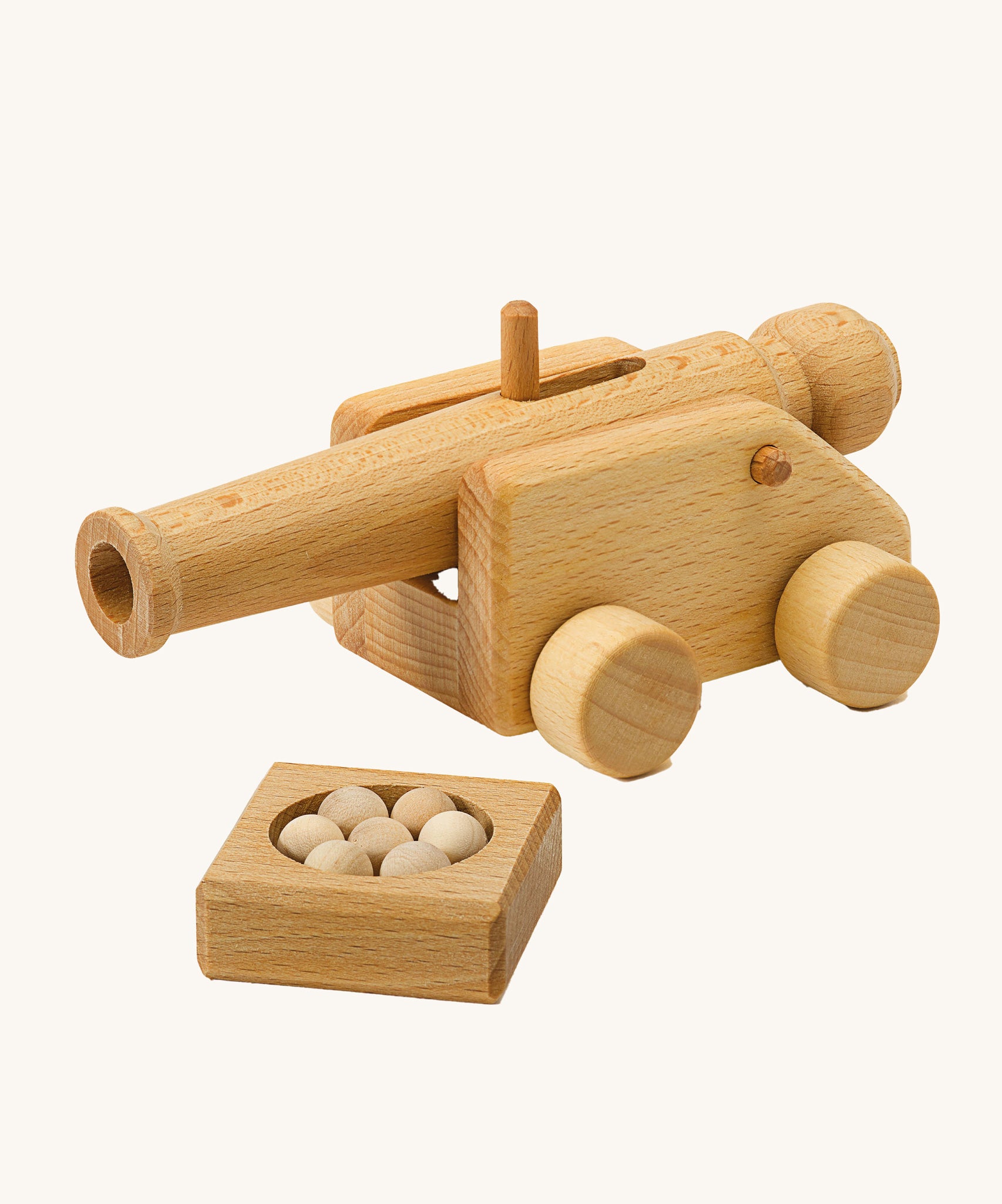 Ostheimer Small wooden Cannon toy With 5 cannon Balls on a plain background.