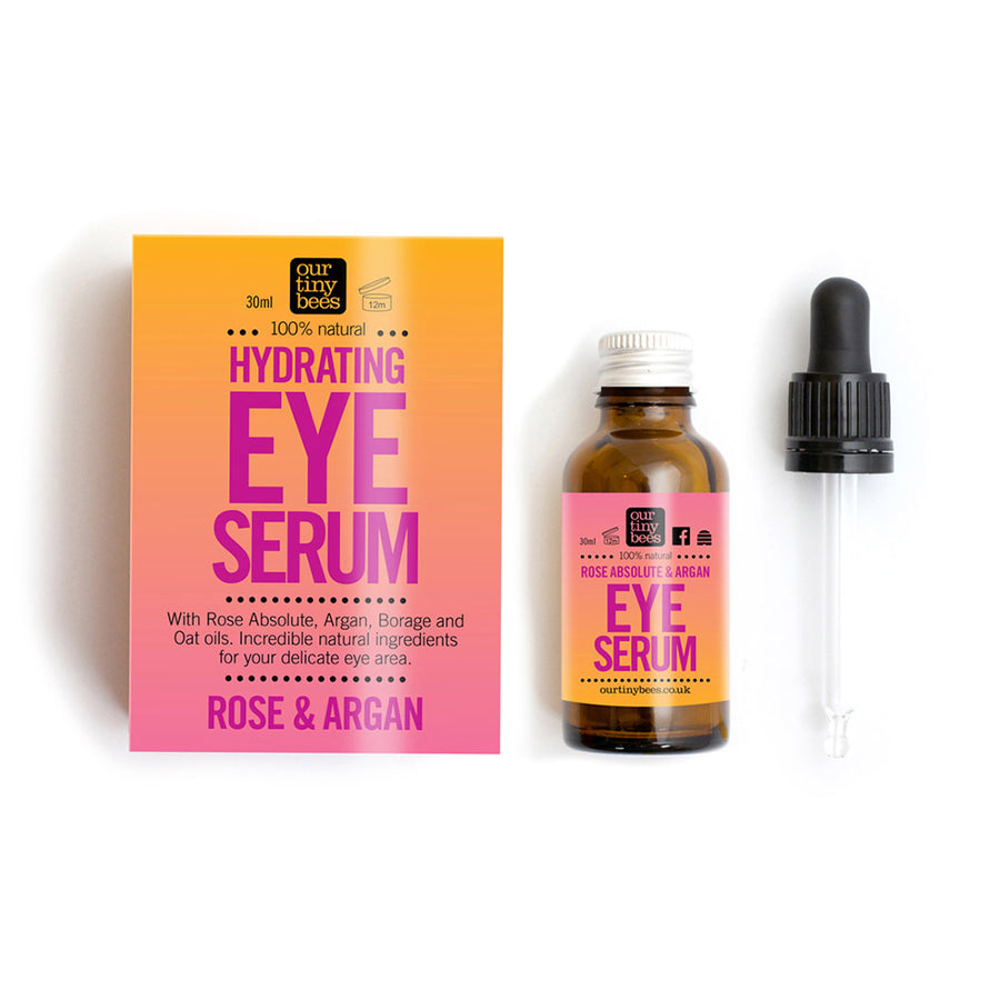 Our Tiny Bees Hydrating Eye Serum bottle next to box and pipette on white background