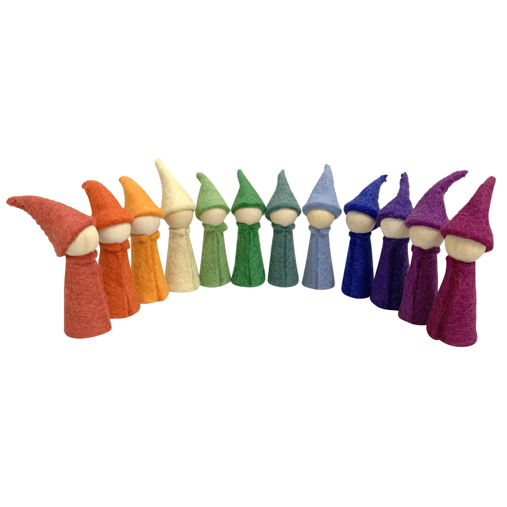 Papoose handmade felt rainbow gnome figures stood in a semi circle on a white background