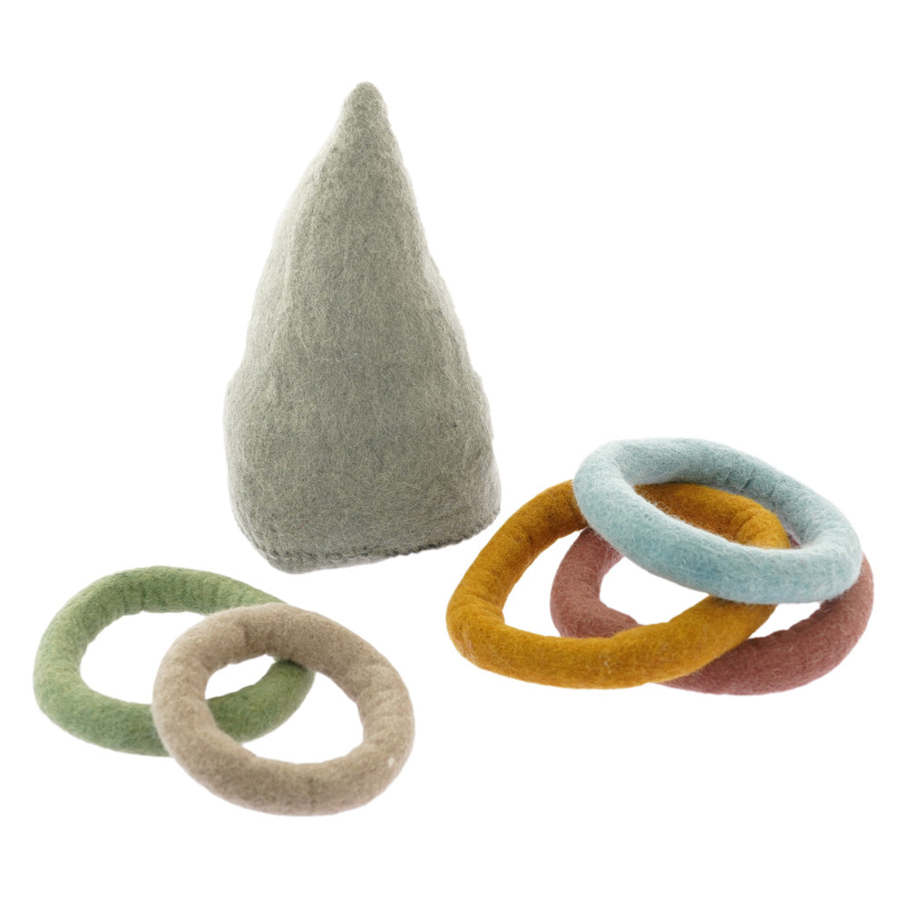 Pieces of the Papoose handmade felt earth rainbow throwing discs game on a white background