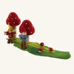 The Papoose Toys Toadstool Garden on a plain background. 
