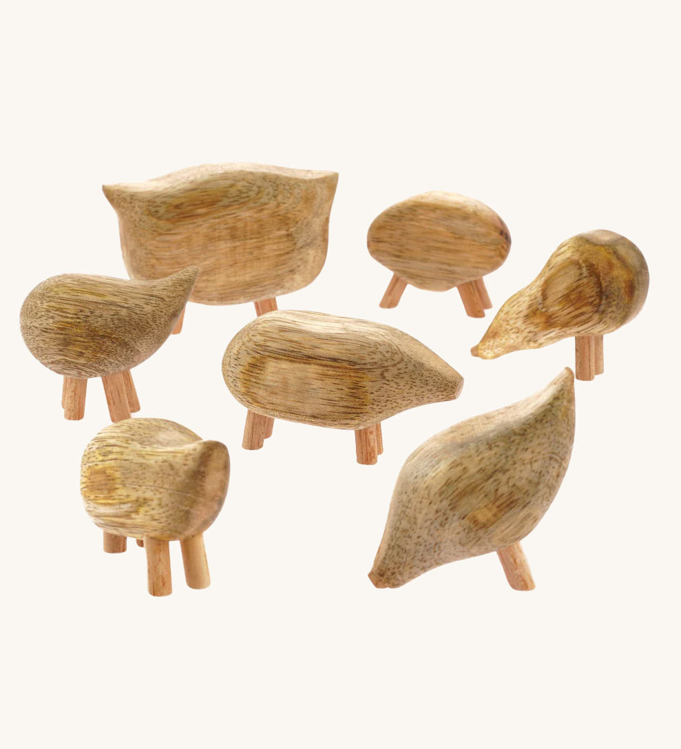 The Papoose Toys Mango Wood Pebble Animals Set on a plain background