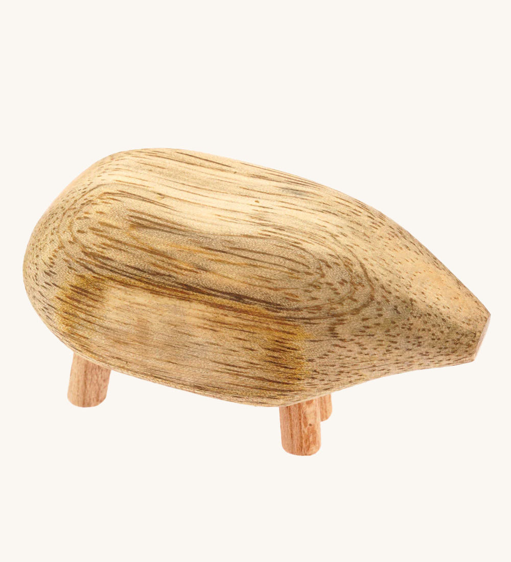 An animal form the Papoose Toys Mango Wood Pebble Animals Set on a plain background. 