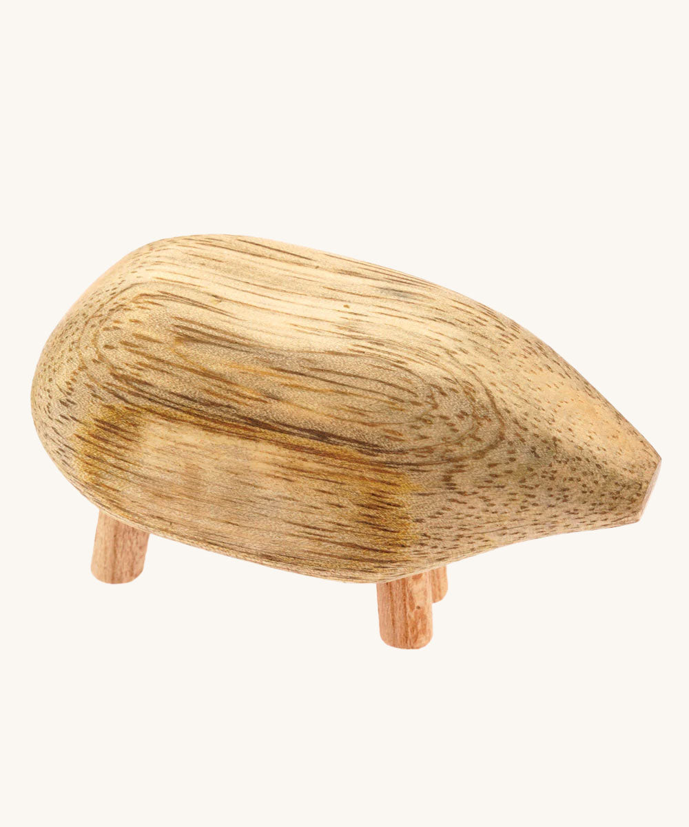 An animal form the Papoose Toys Mango Wood Pebble Animals Set on a plain background. 