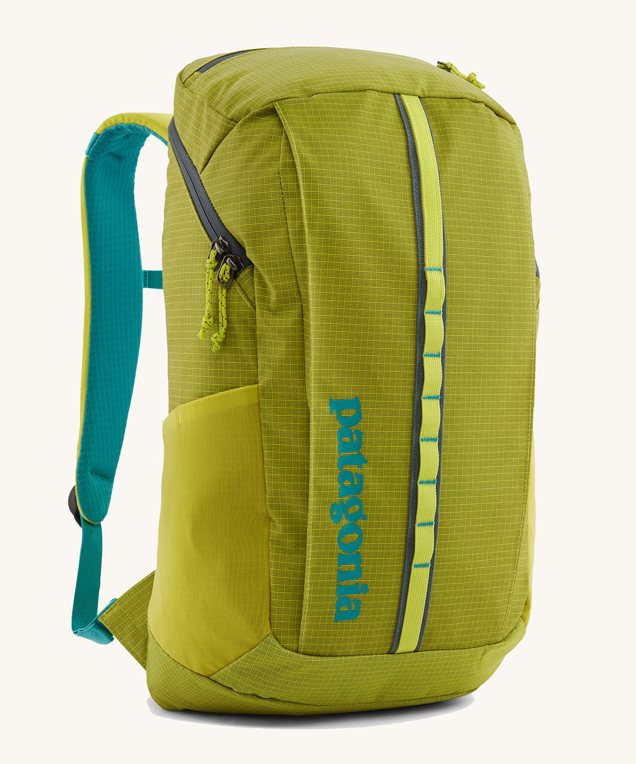 Patagonia Black Hole Recycled Backpack 25L - Phosphorus Green. Showing the front of the bag, on a cream background