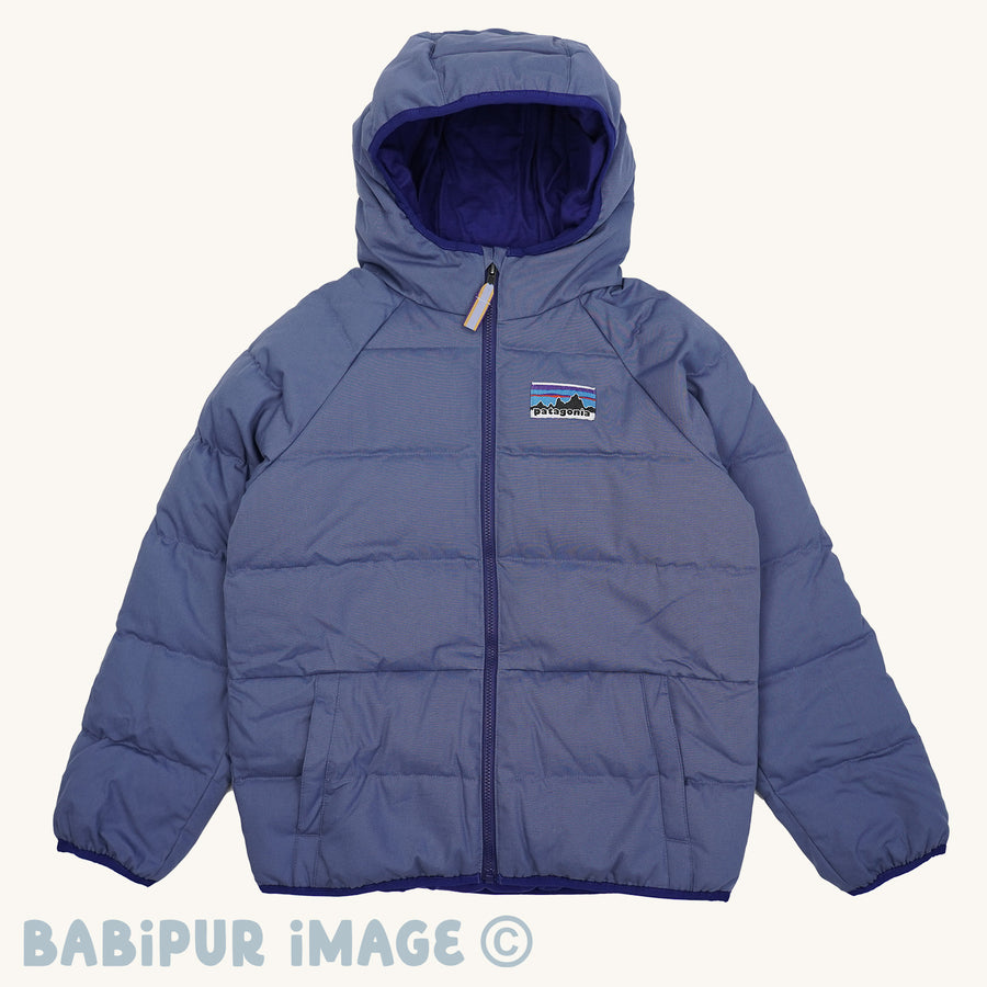 Patagonia Kids Cotton Quilted Down Jacket - Current Blue on a plain background.