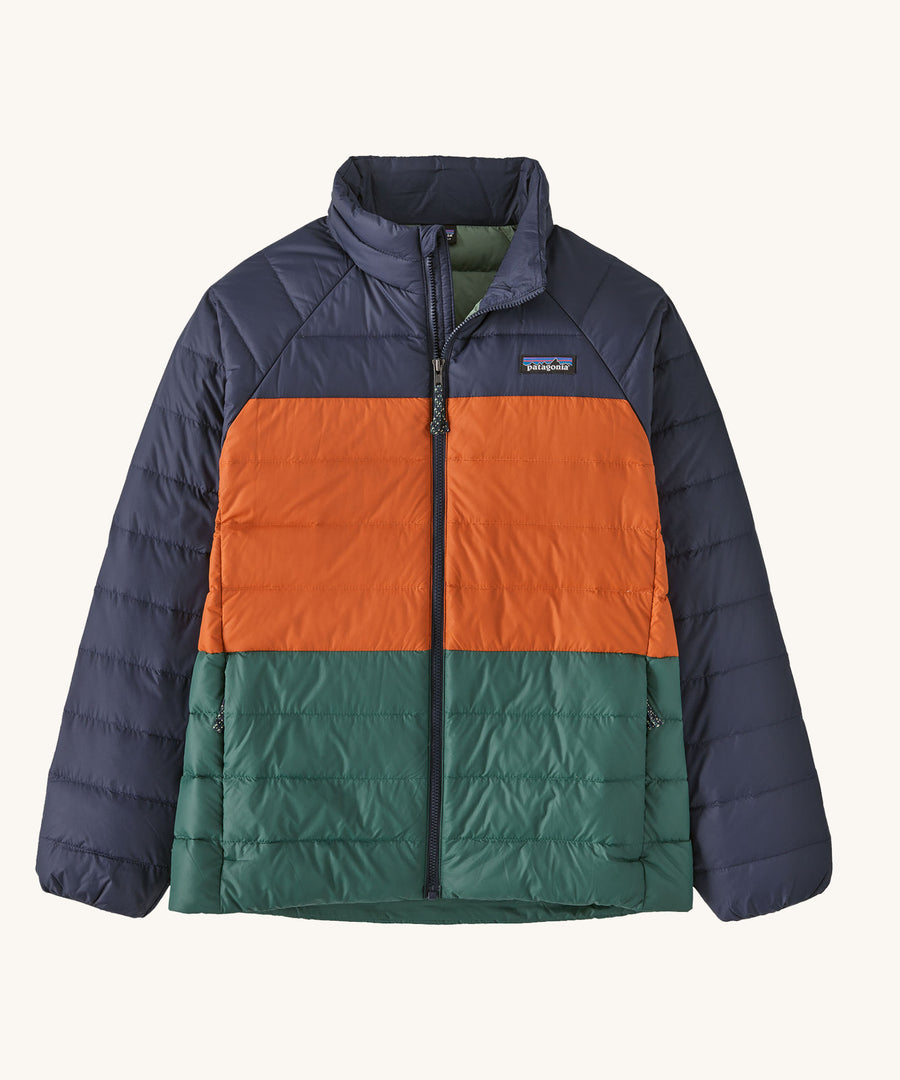  Patagonia Kids Down Sweater in a New Navy colour on a plain background. 