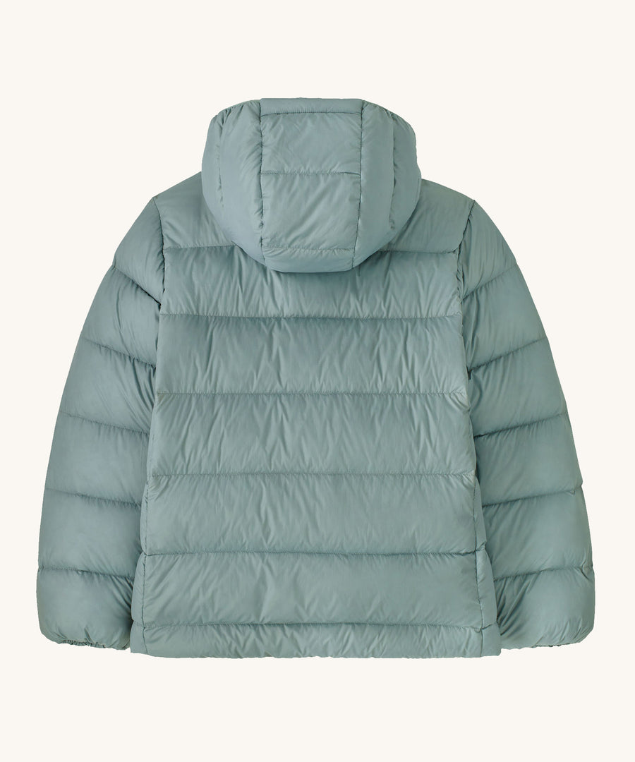 The background of a Patagonia Kids Hi-Loft Down Sweater Hoody in a Thermal Blue colour on a plain background. 