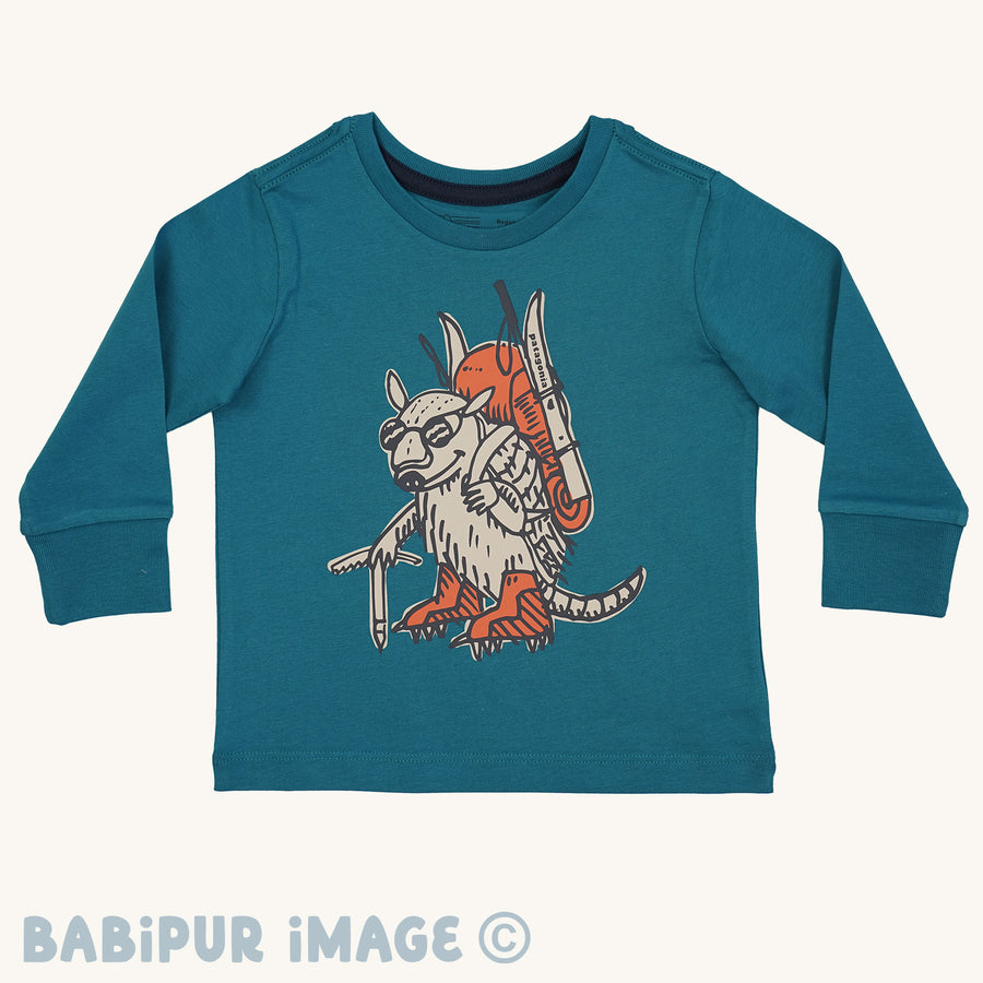 Patagonia Little Kids Regenerative Organic Certified Cotton Long Sleeve Top - Fun Hogs Armadillo/Belay Blue on a plain background.