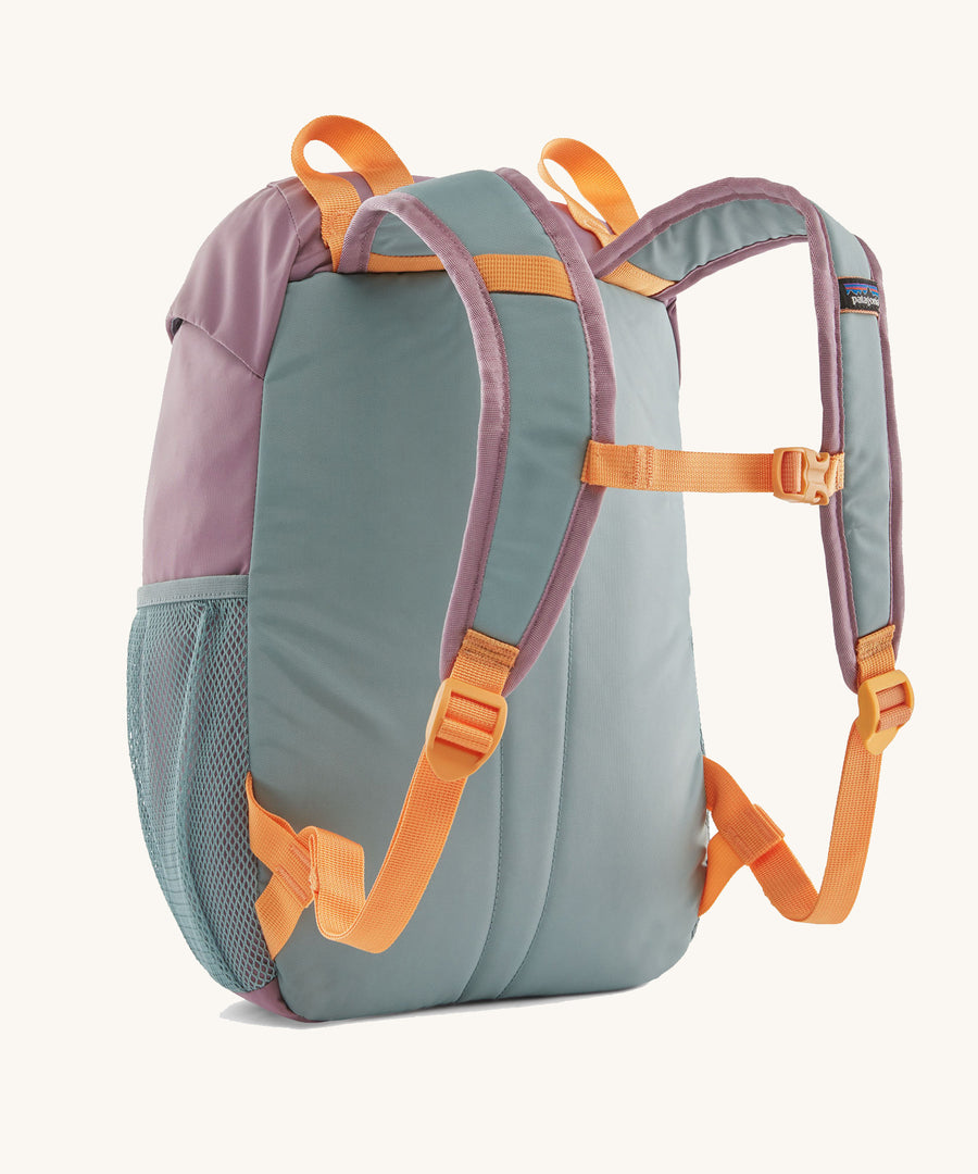 The back of a Patagonia Kids Refugito 12L in a Thermal Blue colour on a plain background. 