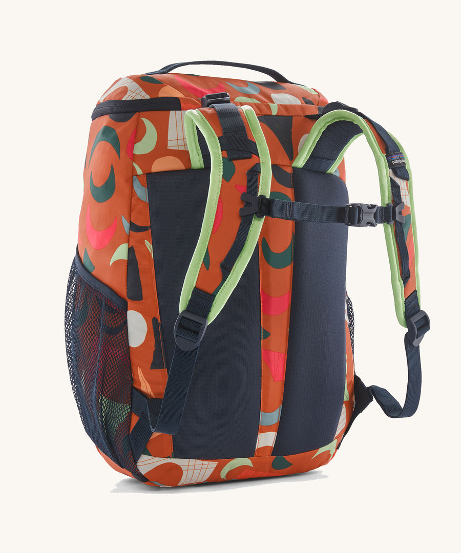 The back of a Patagonia Kids Refugito Day Pack 18L in a Mirage design on a plain background. 