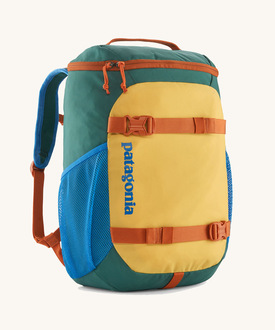 Patagonia Kids Refugito Day Pack 18L in a Conifer Green colour way on a plain background.