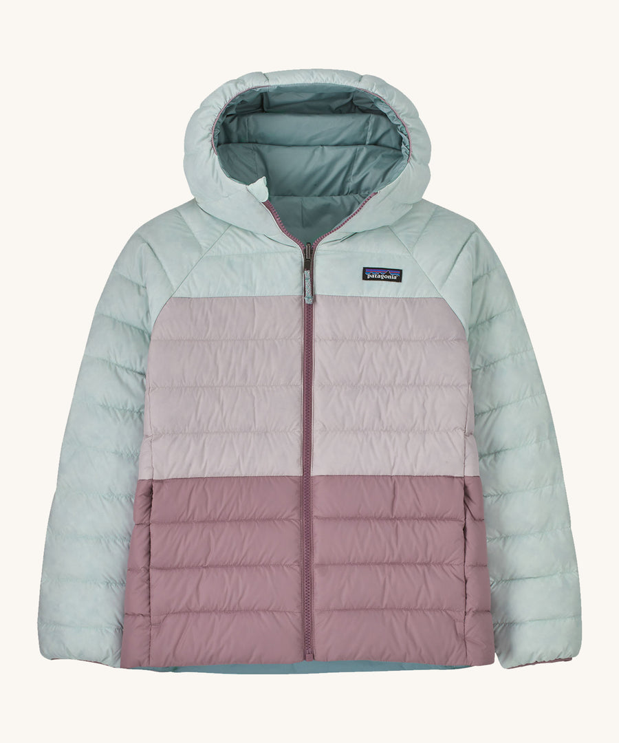 Patagonia Kids Reversible Down Hoody in a Thermal Blue colour on a plain background.