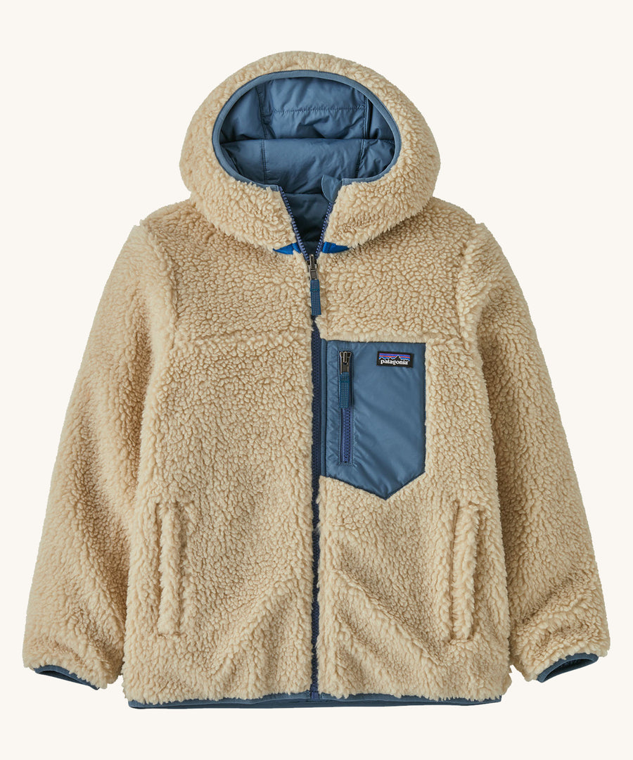 Patagonia Kids Reversible Ready Freddy Hoody in a Utility Blue colour showing the fleece side on a plain background. 