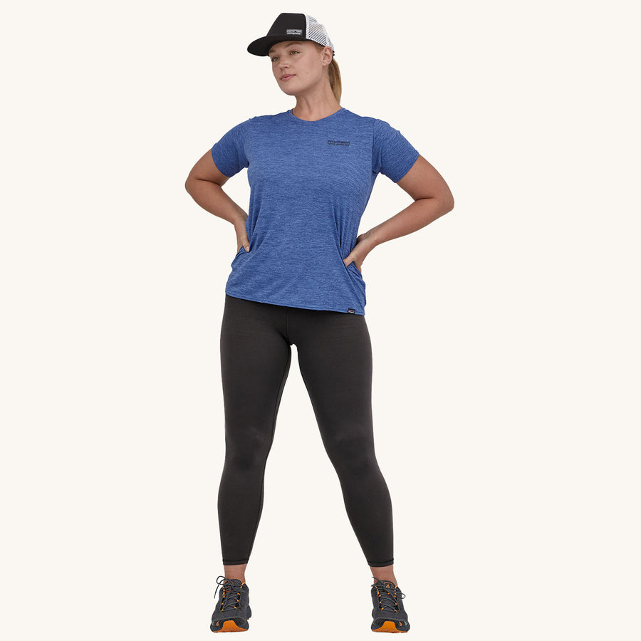 Patagonia Women's Maipo 7/8 Sports Leggings - Black. A woman models the leggings facing towards the camera on a plain background.