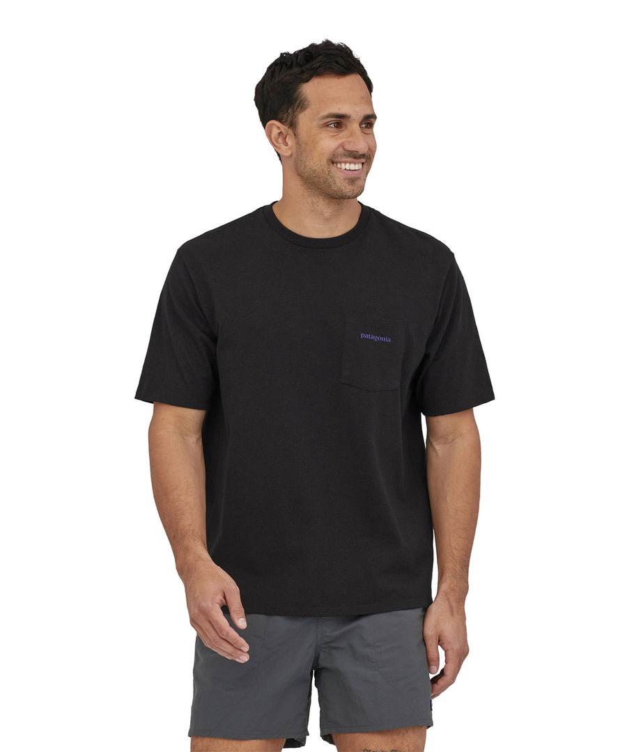 A man wearing a Patagonia Men's Boardshort Logo Pocket Responsibili-Tee Ink Black showing the front