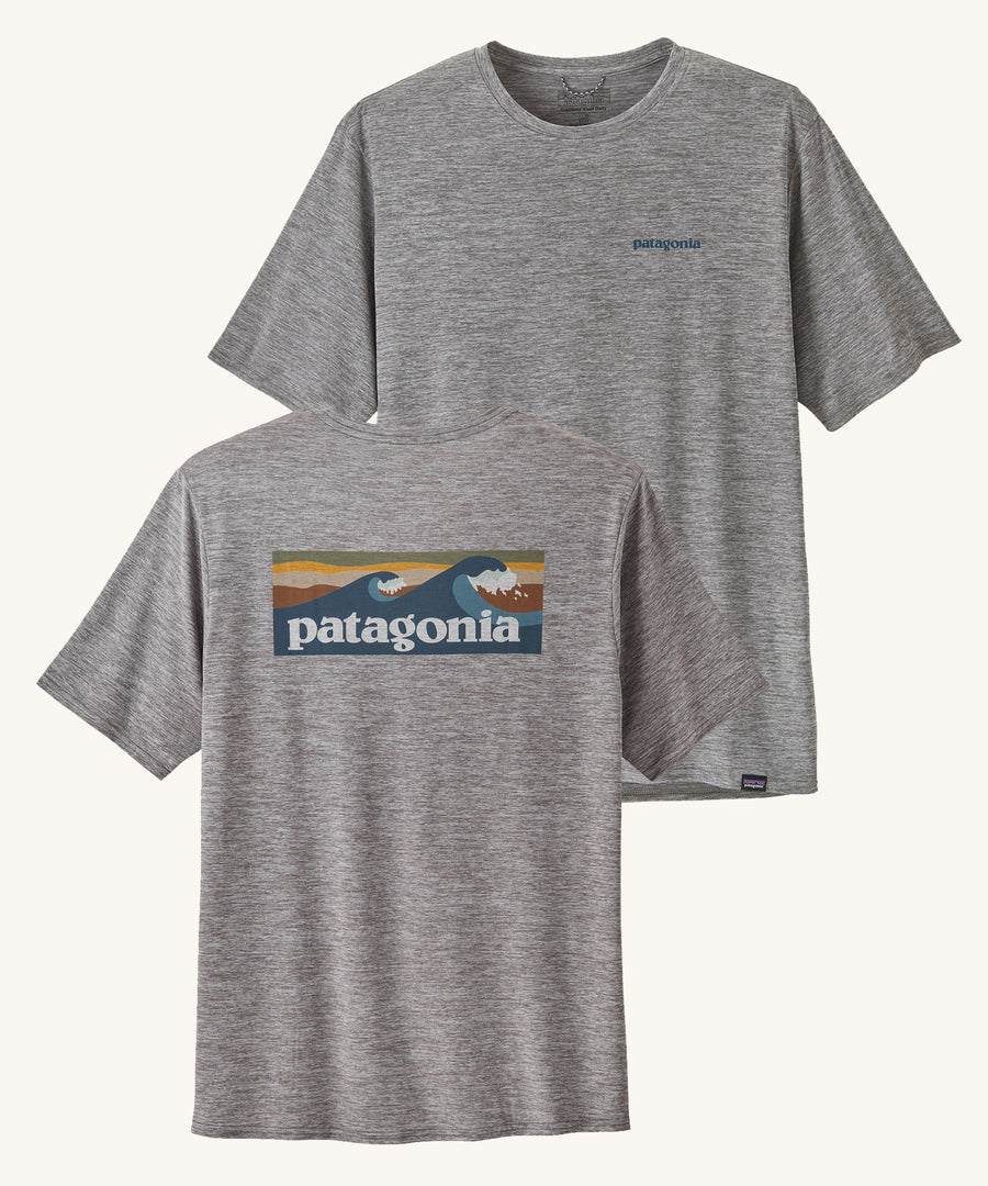 Patagonia Men's Capilene Cool Daily Graphic Shirt with a Waters / Feather Grey showing both sides of the t-shirt. 