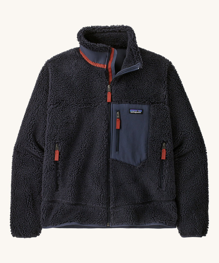 Patagonia Men's Classic Retro-X Jacket in a dark Smolder Blue colour on a plain background. 