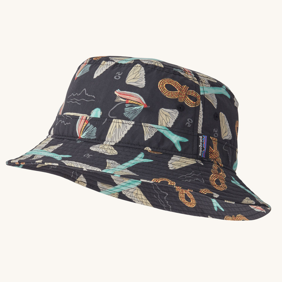 Patagonia Wavefarer Bucket Hat with a Fly 50 design in a Ink Black colour way pictured on a plain background