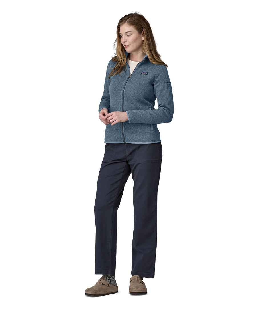 A woman wearing a Patagonia Women's Better Sweater Jacket Utility Blue stood in front of a plain background