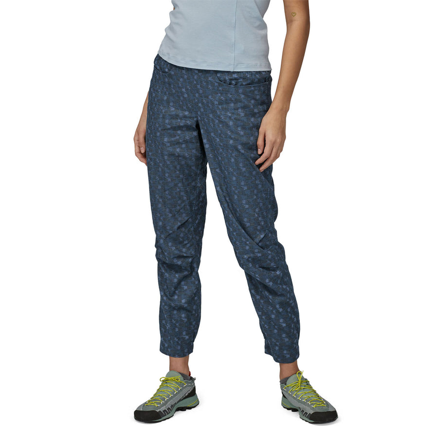 front view of woman wearing the Patagonia womens hampi rock trousers in the intertwined hands: smoulder blue colour