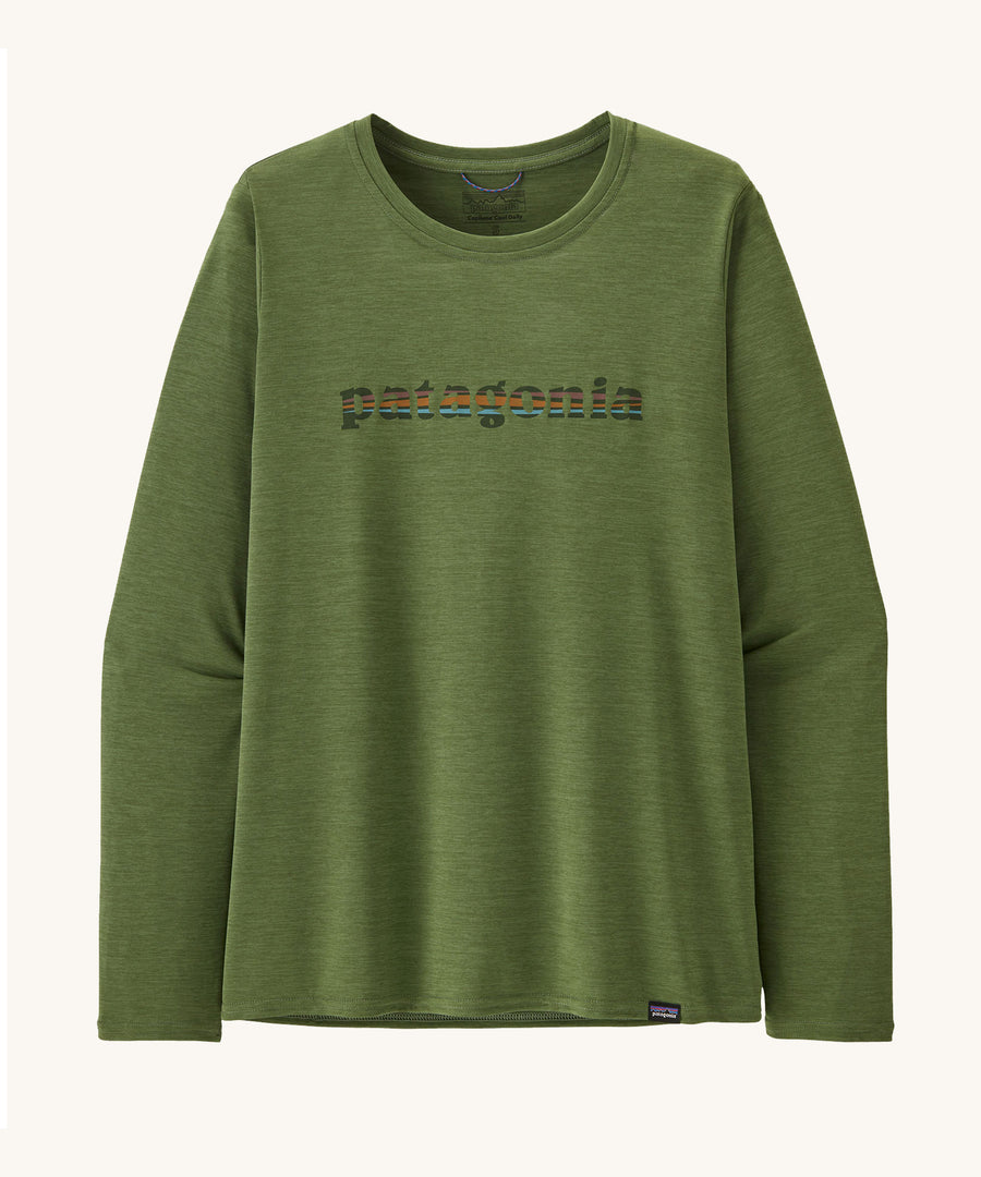 Patagonia Women's L/S Cap Cool Daily Graphic Shirt in a Green X-Dye colour on a plain background. 