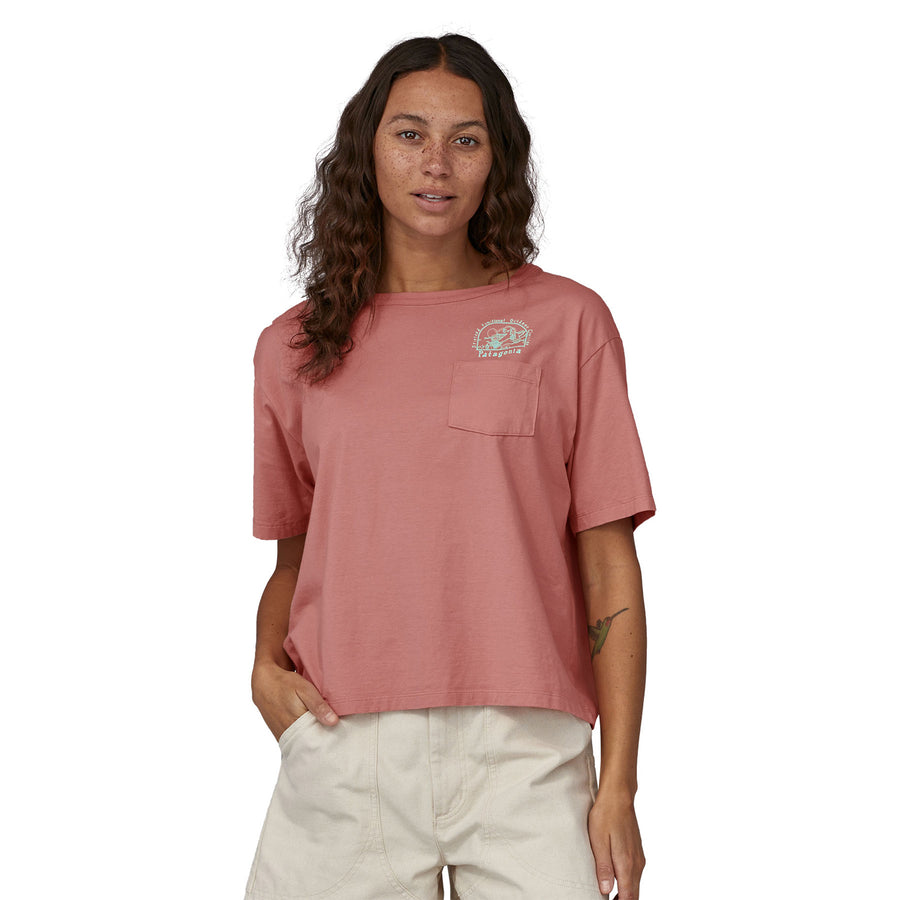 A person wearing the Patagonia Women's Lost and Found Organic Easy Cut Pocket Tee - Sunfade Pink  showing the front of the t-shirt 