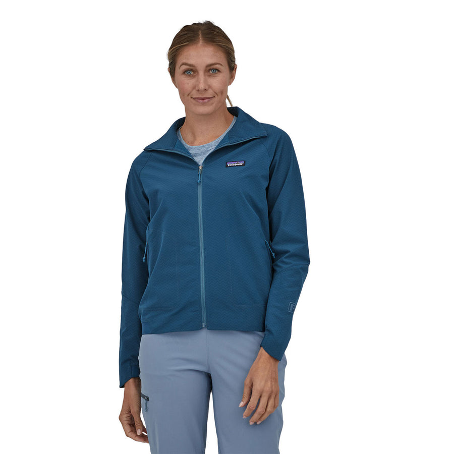 Woman wearing a Patagonia Women's R1 CrossStrata Jacket