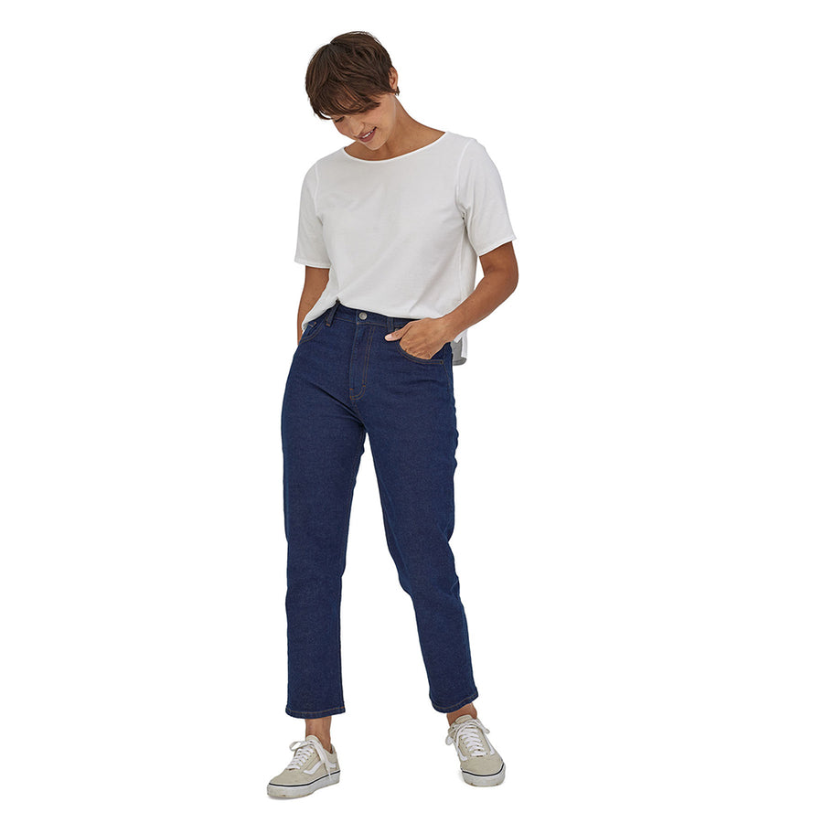 Woman wearing the Patagonia regenerative cotton straight jeans on a white background