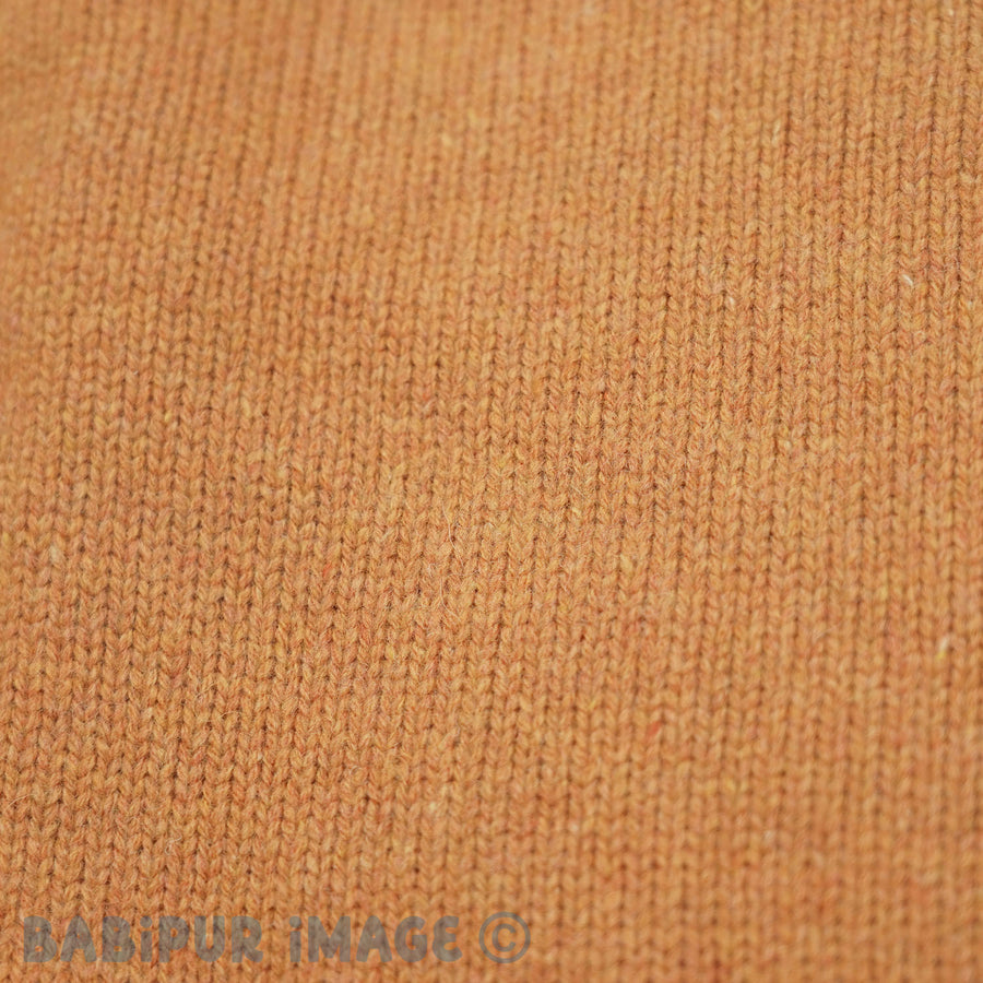 Patagonia Women's Recycled Wool-Blend Hooded Sweater - Dried Mango. Material detail close-up shot.