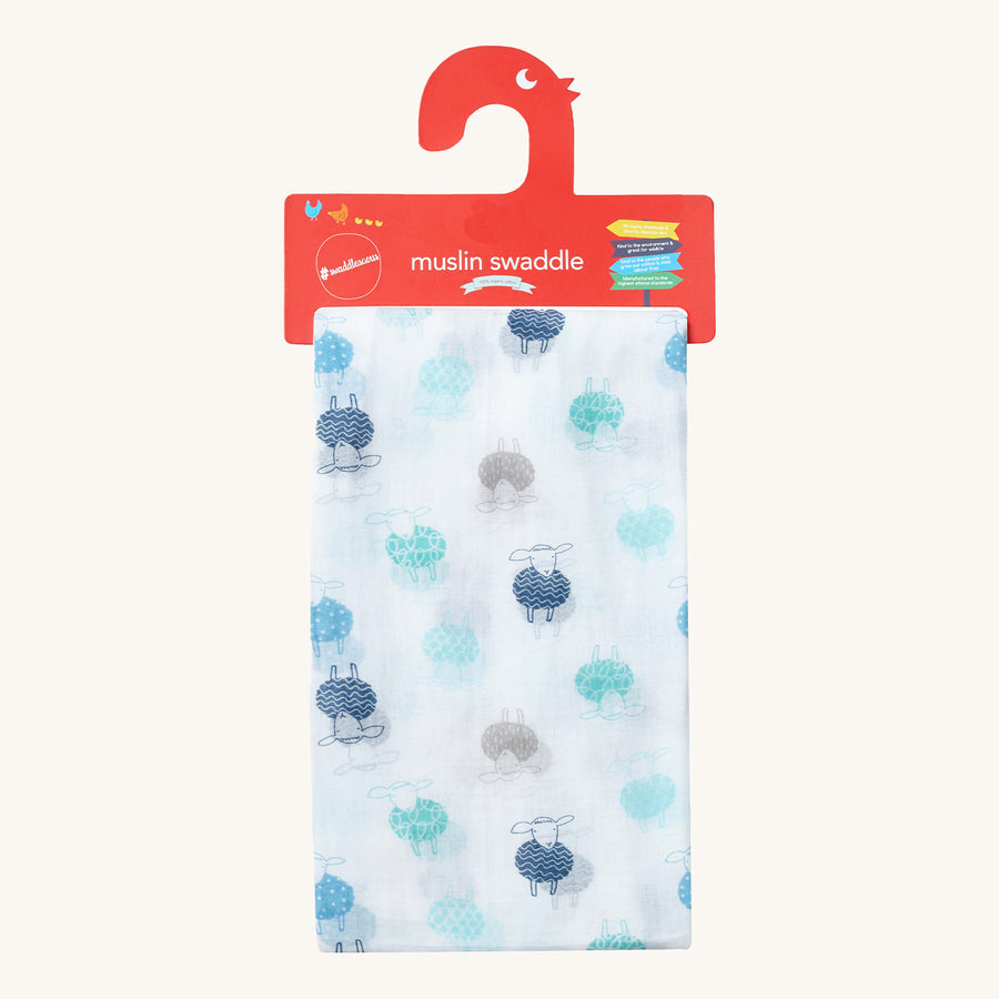 Piccalilly Organic Cotton Baby Muslin Swaddle - Sheep. A beautiful white muslin swaddle cloth with large navy and light blue prints