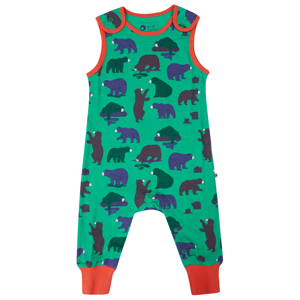 green dungarees with the mountain bear print and red trim from piccalilly