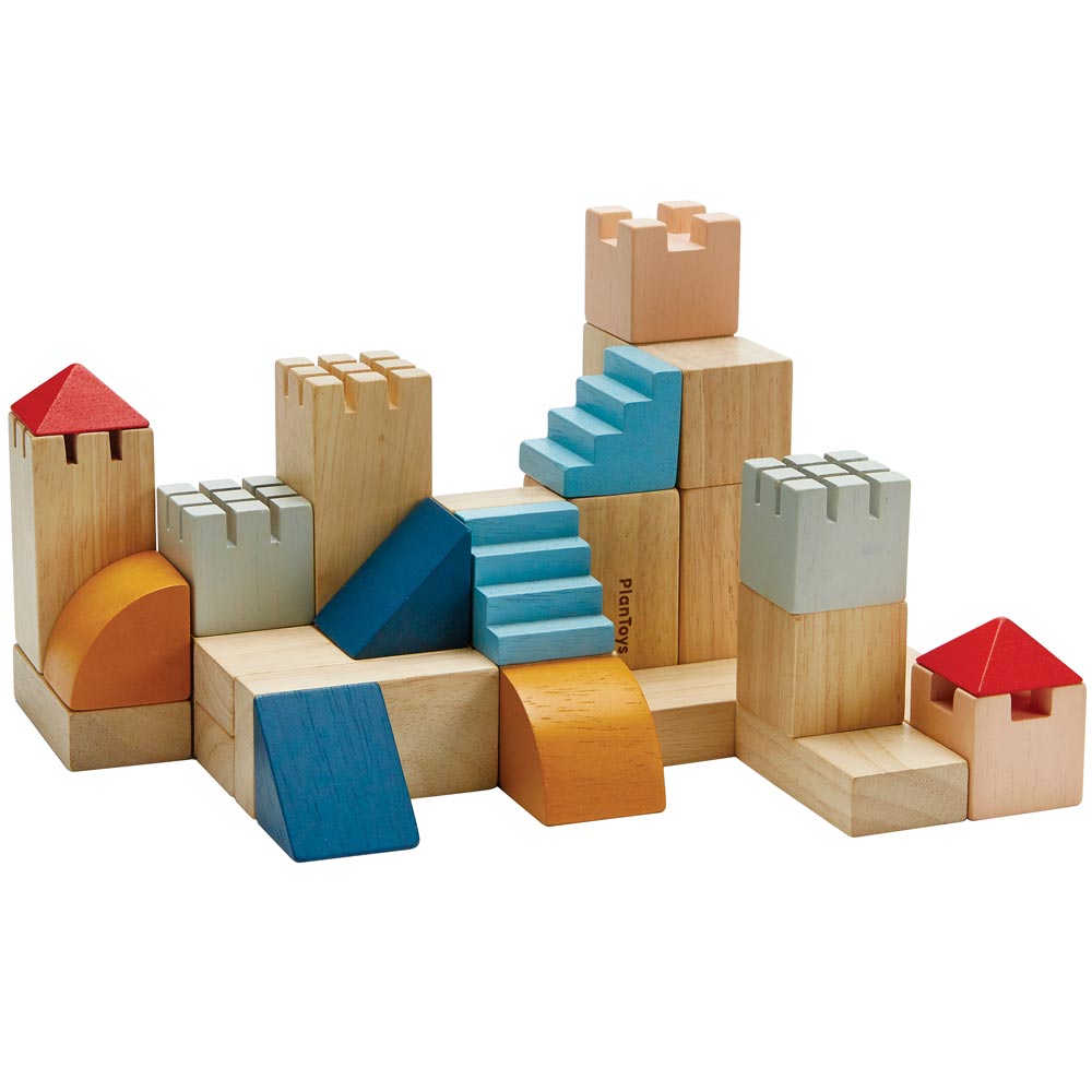 PlanToys Creative Blocks in the Orchard colour way on a plain background. 
