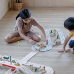 Plan Toys - Ensemble route et rail en caoutchouc