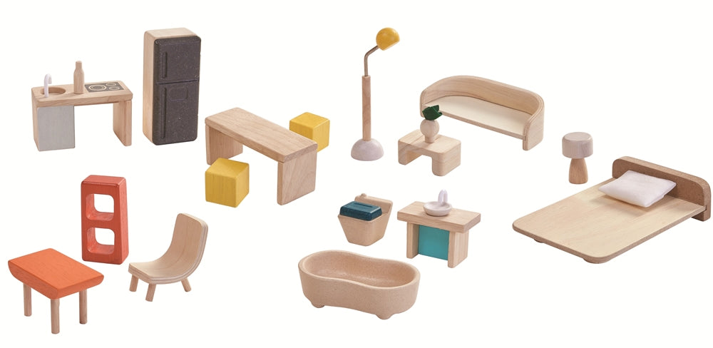 The pieces of furniture included with the PlanToys Slide N Go Dolls' House. 